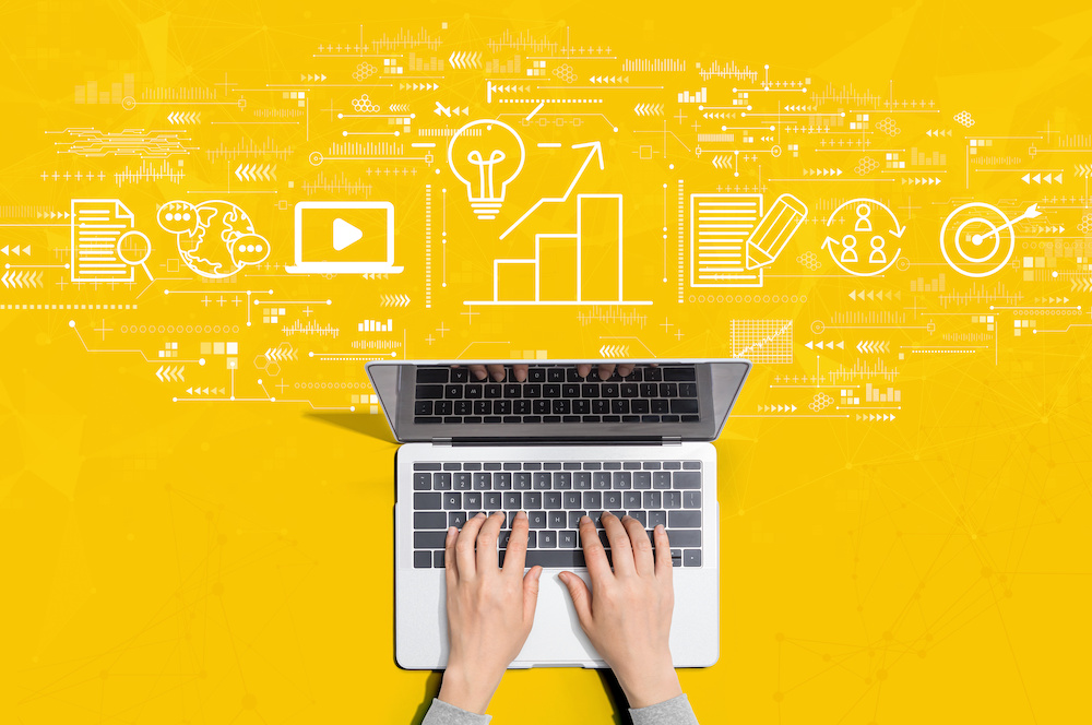 Content marketing concept with person using a laptop computer